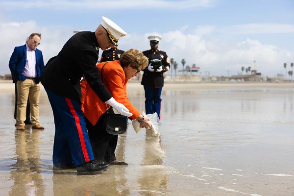Retired U.S. Marine Col. Willard Buhl and Marisa Borzoni, the life partner of retired Lt. Col. Clark Henry, spread Henry’s ashes as part of his memorial service on Marine Corps Base Camp Pendleton, California, Feb. 21, 2023. Henry enlisted during World War II, received a field commission during the Korean War and received a Silver Star during the Vietnam War. The memorial service included a tour of the 1st Marine Division command post and a tour of Camp Pendleton’s Landing Vehicle Tracked Museum. (U.S. Marine Corps photo by Lance Cpl. Juan Torres)
