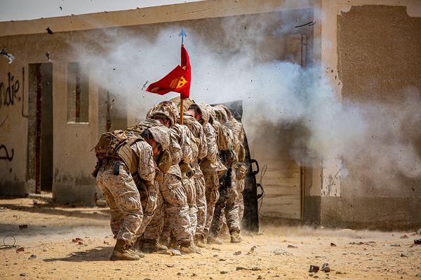 U.S. Marines from 4th Combat Engineer Battalion, 4th Marine Division, Marine Forces Reserve detonate an explosive to conduct breaching techniques with members of partner nation military services during exercise Bright Star 23 at Mohamed Naguib Military Base (MNMB), Egypt, Sept. 7, 2023. Bright Star 23 is a multilateral U.S. Central Command exercise held with the Arab Republic of Egypt across air, land, and sea domains that promotes and enhances regional security and cooperation, and improves interoperability in irregular warfare against hybrid threat scenarios. (U.S. Marine Corps Photo by Capt. Mark Andries)