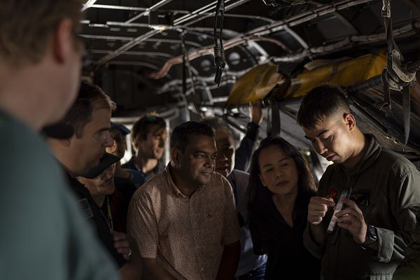 U.S. Marine Corps Capt. Akerin Lab, the digital interoperability coordinator with 3rd Marine Aircraft Wing, demonstrates Mobile User Objective System technology on a Marine Air Ground Tablet to MUOS Program Office personnel at Marine Corps Air Station Miramar, California, Nov. 16, 2023. Members of Space Systems Command and the MUOS Program Office engaged with 3rd MAW and I Marine Expeditionary Force Marines to understand end-user considerations and see MUOS used at the tactical level. MUOS elevates Marine Corps warfighting capabilities by enhancing long-range, rapid communication and expanding the operational reach of the U.S. Armed Forces. (U.S. Marine Corps Photo by Cpl. Daniel Childs) 
