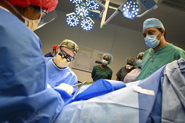 U.S. Air Force Lt. Col. Devin Watson, 81st Medical Group vascular surgeon and St. Lucia Lesser Antilles Medical Team troop commander, performs an arteriovenous graft surgery at Owen King European Union Hospital, Castries, St. Lucia, Feb. 26, 2024. Patient’s needs were aligned with the specialties of USAF medical staff working hand-in-hand with host nation physicians and technicians to ensure continuity of care following all medical procedures. (U.S. Air Force photo by Staff Sgt. Madeline Herzog)