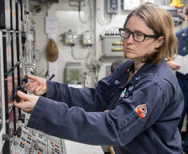 PHILIPPINE SEA (Jan. 29, 2024) Gas Turbine Systems Technician (Electrical) 2nd Class Alyssa Bruce, from Powhatan, Virginia, regulates generator voltage using the electrical plant control console aboard the Arleigh Burke-class guided-missile destroyer USS Dewey (DDG 105). Dewey is assigned to Carrier Strike Group One and is deployed to the U.S. 7th Fleet area of operations in support of a free and open Indo-Pacific. (U.S. Navy photo by Mass Communication Specialist 1st Class Ryre Arciaga)             