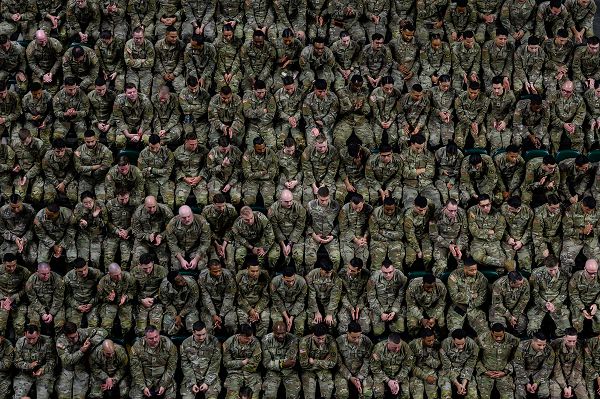 U.S. Army Soldiers with the 44th Infantry Brigade Combat Team, New Jersey Army National Guard, sit in formation during the 44th IBCT’s farewell ceremony at the Cure Insurance Arena, Trenton, New Jersey, Jan. 14, 2024. More than 1,500 NJARNG Soldiers will deploy in support of U.S. Central Command’s Combined Joint Task Force - Operation Inherent Resolve. CJTF-OIR advises, assists, and enables partnered forces until they can independently defeat Islamic State of Iraq and Syria – ISIS – in designated areas of Iraq and Syria, in order to set conditions for long-term security cooperation frameworks. It is the largest deployment of New Jersey Army National Guard Soldiers since 2008.(U.S. Army National Guard photo by Spc. Michael Schwenk)