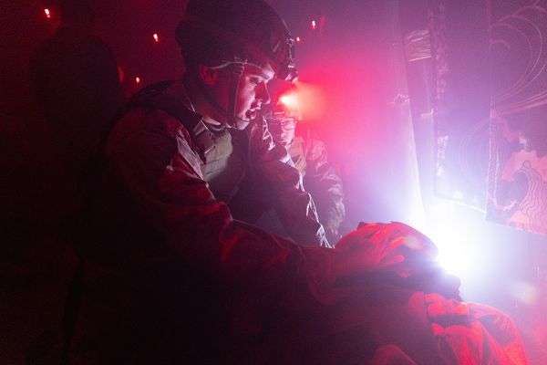 PFC. Johnathan Hernandez, an inventory management specialist with 5th Air Naval Gunfire Liaison Company, III Marine Expeditionary Force Information Group, inspects a simulated casualty for trauma during a Combat Life Saver course final exam at Camp Hansen, Okinawa, Japan, Dec. 22. The CLS course aims to eliminate preventable deaths by teaching all Marines and Sailors the Tactical Combat Casualty Care curriculum and integrating it into small unit tactics and battle drills. The course provides Marines with advanced skills needed to render effective care to casualties in the absence of a corpsman. Hernandez is a native of Burtonsville MD. (U.S. Marine Corps photo by Cpl. William N. Wallace)