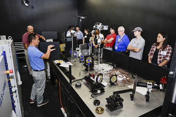 NORCO, Calif. (July 19, 2023) Tam Vo, an electrical engineer in the High Energy Laser and Metrology Lab at Naval Surface Warfare Center, Corona Division, addresses a cohort of local high school students selected as part of Science and Technology Education Partnership’s, “STEM in Defense,” pilot program hosted by the warfare center in Norco, California, July 19, 2023. The program is one of STEP’s STEM Summer Learning Labs and gave participants a hands-on learning experience focused on career opportunities in defense including cybersecurity, data analytics and the commercialization of military technology. (U.S. Navy photo by Neil Mabini)