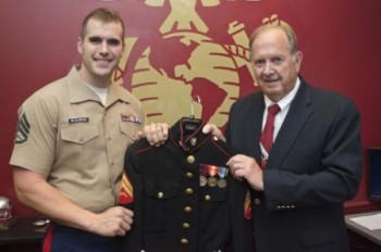 Marine Corps Staff Sgt. Max G. Neighbors, a canvassing recruiter with Recruiting Station Baltimore, and Robert L. Thomas and his Marine Corps dress blues jacket support our troops marine corps vet recalls experiences