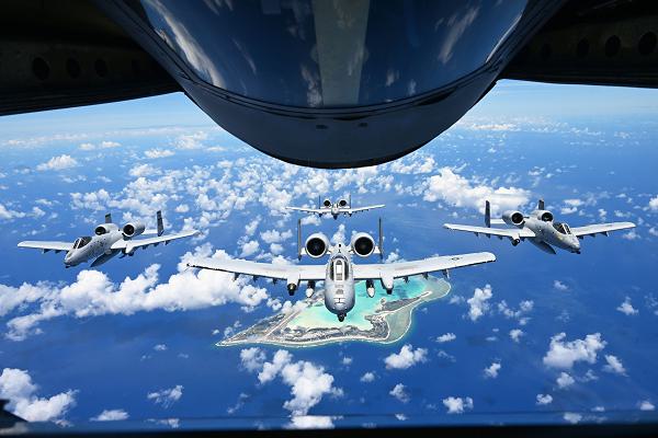 U.S. Air Force A-10 Thunderbolt II from the 25th Fighter Squadron, Osan Air Force Base, South Korea, fly in formation over Wake Island, June 7, 2025. The A-10 is a twin-engine, straight-wing, subsonic attack aircraft designed for close air support that has been flying for over 53 years. (U.S. Air Force photo by Senior Airman Audree Campbell)