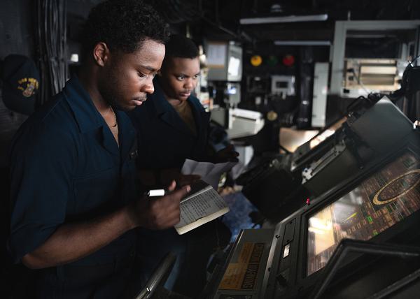 ATLANTIC OCEAN (April 11, 2024) Seaman Aleeke Johnson and Seaman Ijiah Corbett, both assigned to the San Antonio-class amphibious transport dock USS New York (LPD 21), participate in helmsman training on the ship’s bridge, April 11, 2024. Helmsmen are responsible for steering and adjusting the ship’s course and speed. New York is operating in the U.S. 2nd Fleet area of operations as part of the Wasp Amphibious Ready Group-24th Marine Expeditionary Unit. Naval integration provides combatant commanders and America’s civilian leaders highly-capable forces that deter adversaries, underpin American security and economic prosperity, and reassure her allies and partners. (U.S. Navy photo by Mass Communication Specialist 2nd Class Jesse Turner)   