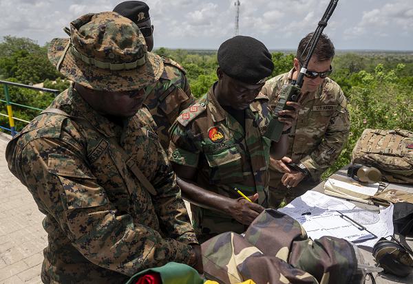 U.S. forces under U.S. Special Operations Command Africa and members of the Ghana Armed Forces practice calling in a close air support nine-line brief with two U.S. Air Force B-1B Lancer aircraft and simulated 107mm artillery fire as part of Flintlock 24 at Bundase Training Camp, Ghana, April 19, 2024. U.S. forces, in coordination with our African and international partners, continue to work together to counter transnational threats, strengthen security force readiness, and respond to crises to advance U.S. interests and promote regional security, stability, and prosperity in Africa.  (U.S. Air Force photo by Tech. Sgt. Christopher Dyer)
