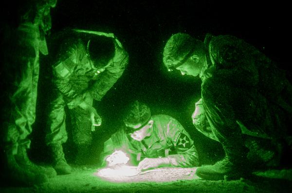 U.S. Army Soldiers assigned to the 2nd Infantry Division/ROK-U.S. Combined Division conduct the night land navigation during the Best Squad Competition in Camp Casey, South Korea, April 30, 2024. The 2ID/RUCD conducts the Best Squad Competition to build esprit-de-corps, identify the best squad within the Division to compete at the 8th Army Best Squad competition, and build a fight tonight mentality across the Division. (U.S. Army Photo by KCpl. Mingyu Ju)