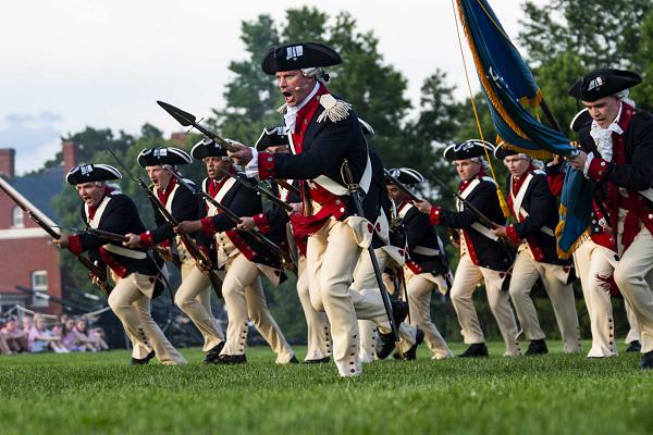 Soldiers from the U.S. Army Military District of Washington's ceremonial units perform during a 2024 Twilight Tattoo show at Joint Base Myer-Henderson Hall, Virginia on May 22, 2024. The event celebrated the strength, traditions, and history of the U.S. Army through dramatic vignettes and musical numbers. (U.S. Army Photo by Sgt. Natalie Pantalos)