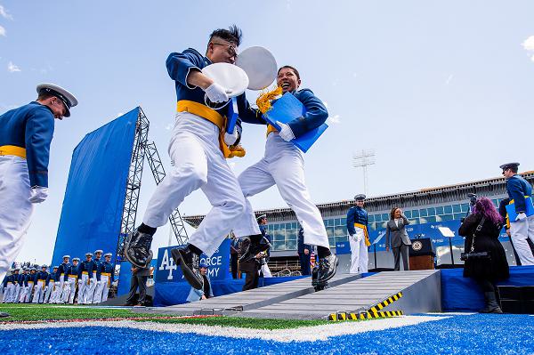 U.S. AIR FORCE ACADEMY, Colo. — Cadets celebrate after receiving their diploma during the U.S. Air Force Academy Class of 2024 Graduation Ceremony at Falcon Stadium in Colorado Springs, Colo., May 30, 2024. Nine-hundred-seventy-four cadets crossed the stage to become the Air Force/Space Force’s newest second lieutenants. (U.S. Air Force photo/YOUR NAME HERE)