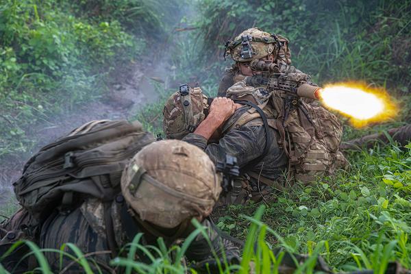 U.S. Army Sgt. Ratu Komaisavai, a sniper assigned to the 100th Infantry Battalion, roleplaying as opposing forces (OPFOR), fires blank rounds during a simulated n engagement as part of the Joint Pacific Multinational Readiness Center-Exportable (JPMRC-X) exercise at Fort Magsaysay, Philippines, June 7, 2024. This iteration of JPMRC-X marks the first deployment to the Philippines, which will enable and assist the Philippine Army and the Armed Forces of the Philippines in building combat training center locations within the Philippines.The JPMRC-X is a Department of the Army initiative consisting of a deployable package of personnel and equipment designed to support training exercises across the Pacific. (U.S. Army National Guard photo by Staff Sgt. Thomas Moeger)