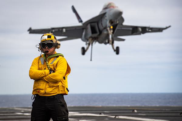 An F/A-18F Super Hornet from the “Fighting Redcocks” of Strike Fighter Squadron (VFA) 22 prepares to make an arrested landing on the flight deck of the aircraft carrier USS Nimitz (CVN 68) July 16, 2024, in the Pacific Ocean. Nimitz is underway conducting routine operations. (U.S. Navy photo by Mass Communication Specialist 2nd Class Hannah Kantner)
