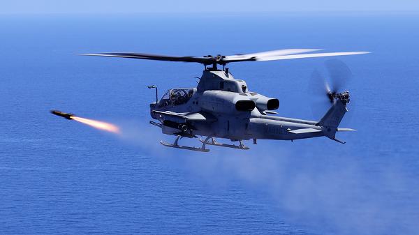 U.S. Marine Corps AH-1Z attack helicopter pilots with Marine Medium Tiltrotor Squadron 262 (Rein.), 31st Marine Expeditionary Unit, fire an AGM-179 joint air-to-ground munition (JAGM) during an expeditionary (EXPO) strike, off the coast of Okinawa, Japan, June 26, 2024. This EXPO strike launched the first JAGM off an AH-1Z in the Indo-Pacific region. The JAGM provides a true “fire and forget” capability to guide the missile to endgame, able to destroy fast-moving maritime targets like fast attack craft (FAC) in rough sea states. The 31st MEU, the Marine Corps’ only continuously forward-deployed MEU, provides a flexible and lethal force, ready to perform a wide range of military operations as the premiere crisis response force in the Indo-Pacific region. (U.S. Marine Corps photo by Cpl. Christopher Lape)
