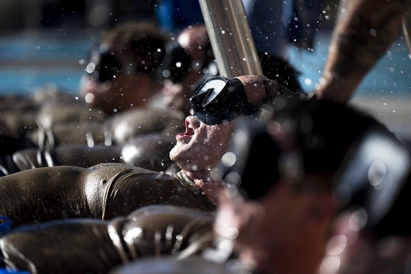 Combat rescue officer candidates perform flutter kicks on the edge of a pool during the CRO Phase II screening process in Tucson, Arizona, Oct. 21, 2024. Applicants were tested on their ability to lead a team while dealing with high levels of stress. (U.S. Air Force photo by Senior Airman Devlin Bishop)