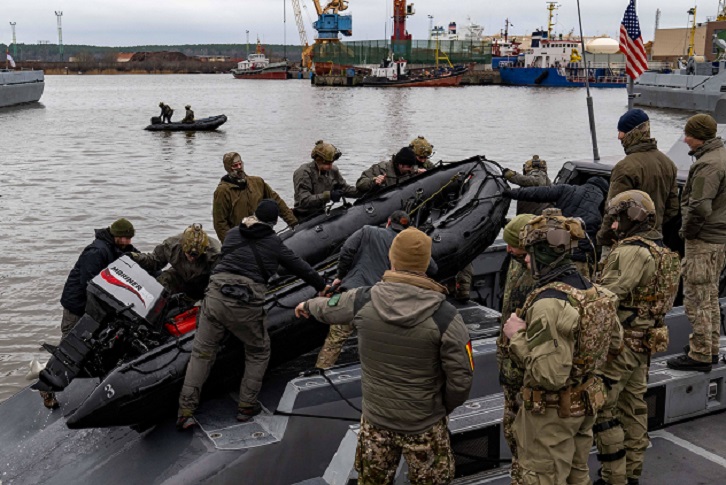 KLAIPEDA, Lithuania (Jan. 22, 2025) East-coast based U.S. Naval Special Warfare Operators (SEALs) conduct maritime training with Lithuanian and German special operations forces. This training showcases U.S. forces’ lethality as well as re-establishes the U.S. military as a formidable deterrent to those who may try to test America’s military capabilities. (U.S. Navy photo by Mass Communication Specialist 1st Class Bill Carlisle)